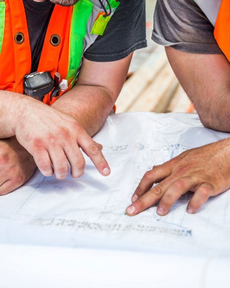 Century Solutions crew reviewing the drilling programme on location