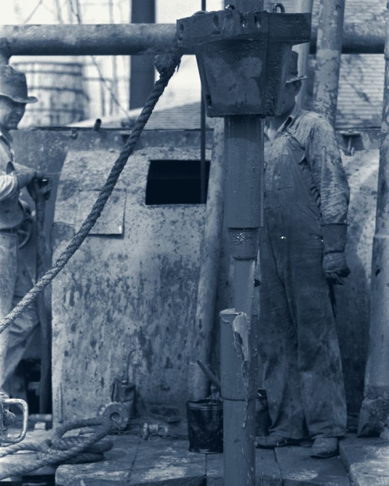 Drill-floor work on a rotary rig, 1940s archival photograph - the hazards have not changed; the planning has