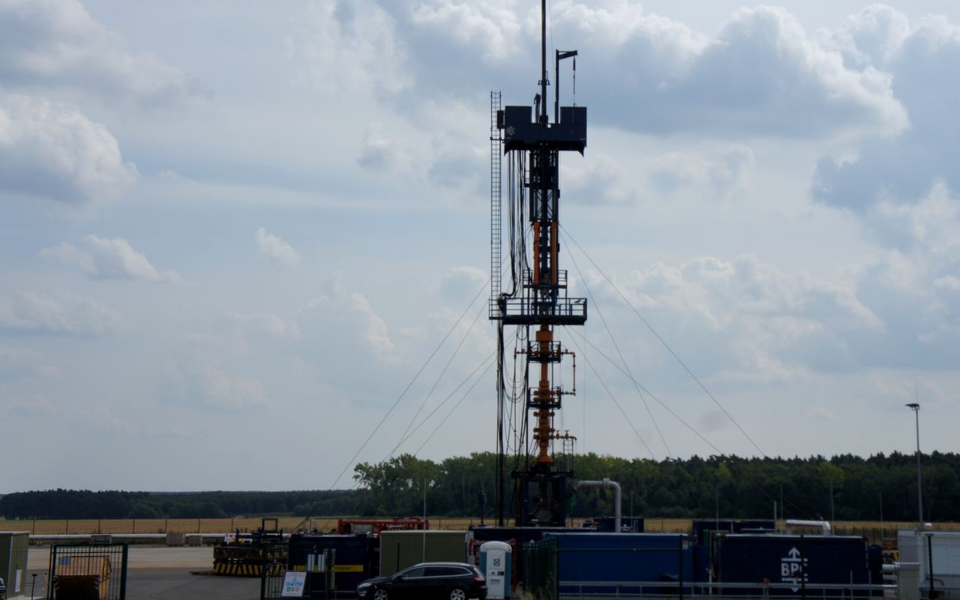 Drilling rig and support equipment on a multi-well pad